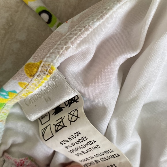 Fits like an XS. Embroidered bikini top. - Picture 4 of 4